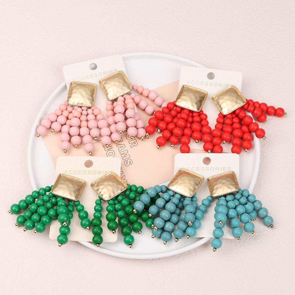 Khuyên Tai Kim Loại Dạng Hạt Gỗ Tua Rua Thời Trang