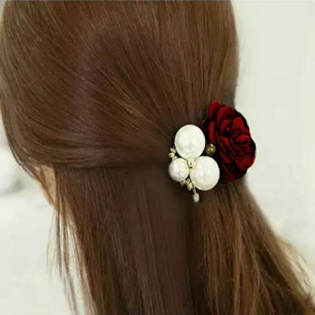 Cột tóc hoa hồng