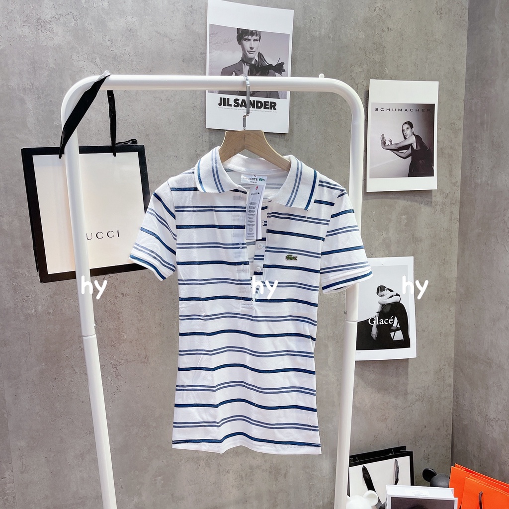 Áo polo trắng Lacoste cá sấu nam nữ sọc ngang