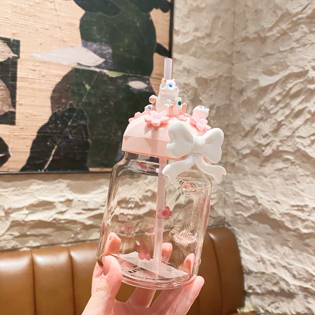 Ly thủy tinh STARBUCKS màu hồng Sakura có quai cầm và ống hút dung tích 400ml