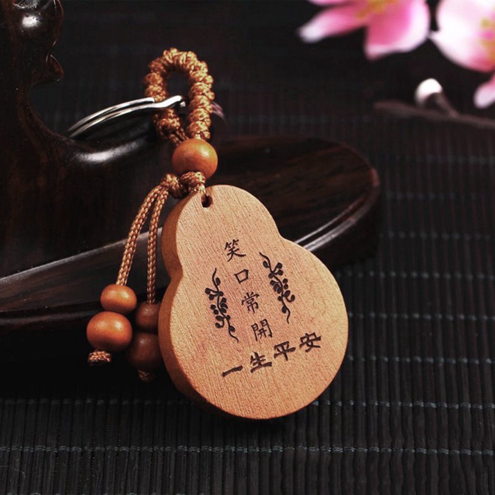 Móc chìa khóa hình đức Phật may mắn bằng gỗ tự nhiên chất lượng cao