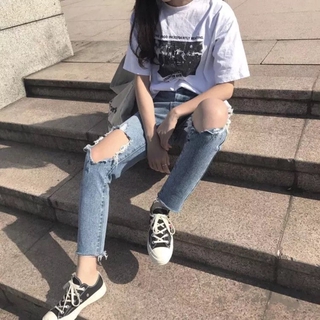 Quần bò rách gối