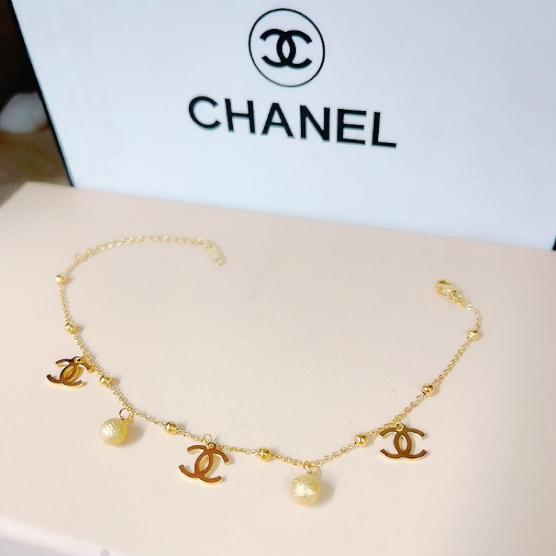 Lắc chân titan chử X mạ vàng ko đen