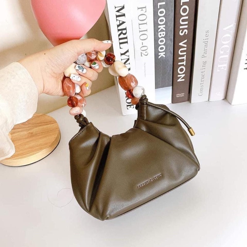 Túi cnk tay cầm đá đeo chéo