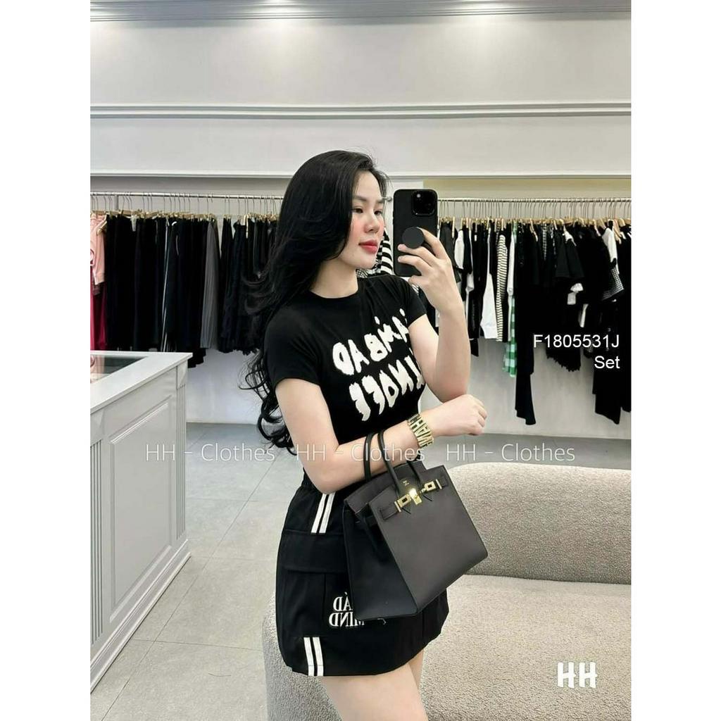 Set bộ thun thể thao áo dáng ngắn in chữ tay con kèm chân váy pha sọc trắng hai bên!