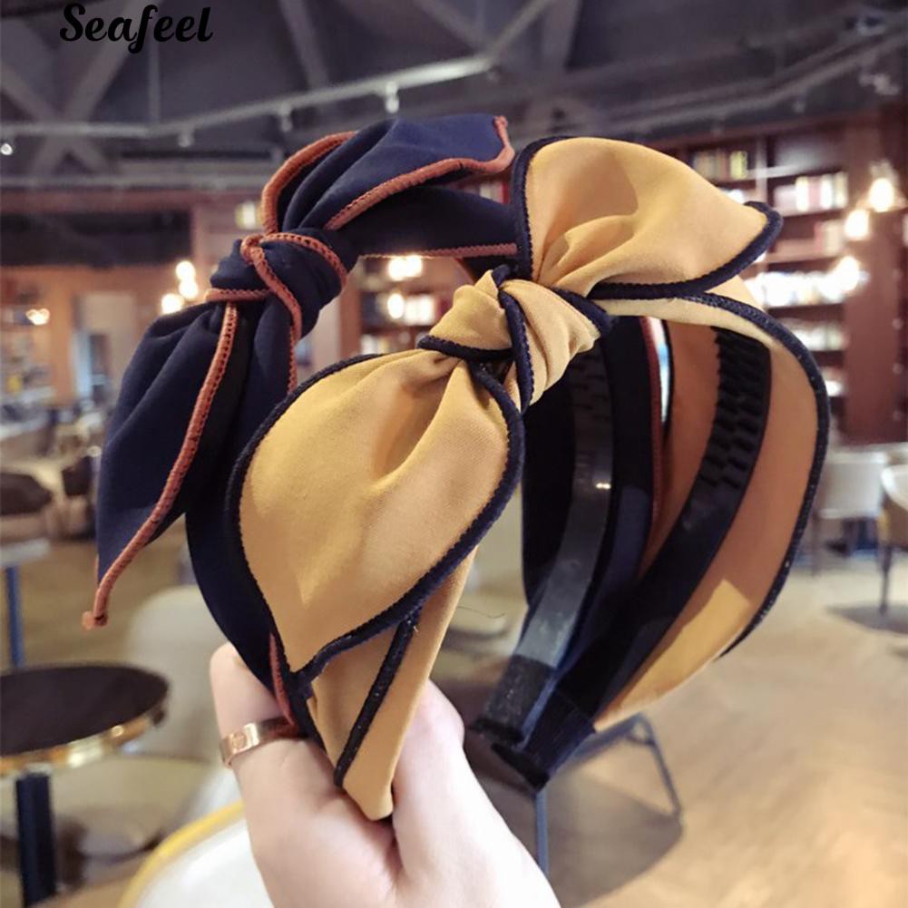 Cài tóc đính nơ màu trơn cho nữ