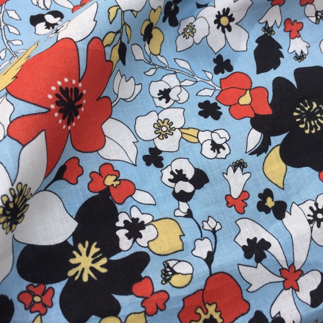 Vải thô cotton hoa phượng màu cam đất.