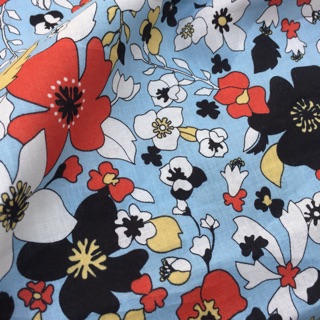 Vải thô cotton hoa phượng màu cam đất.