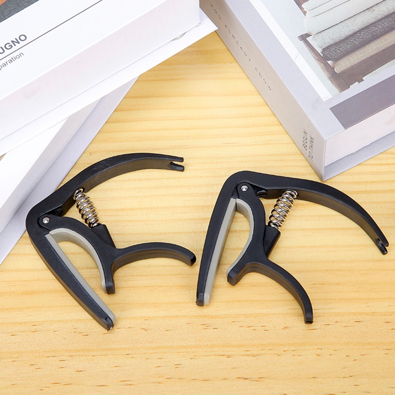 Capo 4 Dây Đàn Guitar 6 Dây Bằng Nhựa Nylon Và Silicone Tiện Dụng