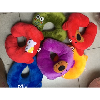 Gối kẹp cổ dùng để ngủ khi đi xe
