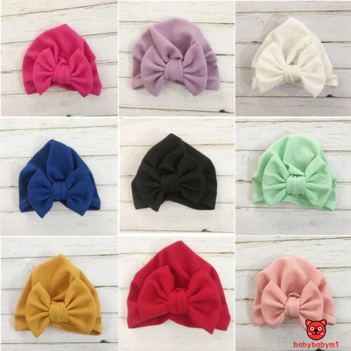 Mũ beanie đính nơ màu sắc kẹo ngọt cho bé