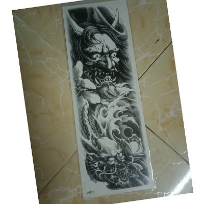 Hình xăm dán mặt quỷ full tay nửa lưng