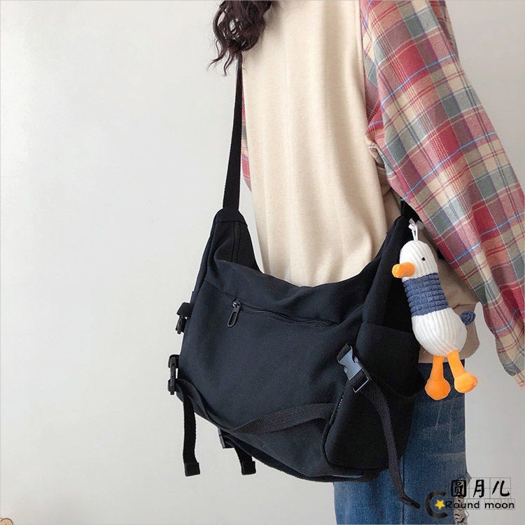 RX125 - túi đeo chéo unisex năng động và cá tính chất liệu canvas