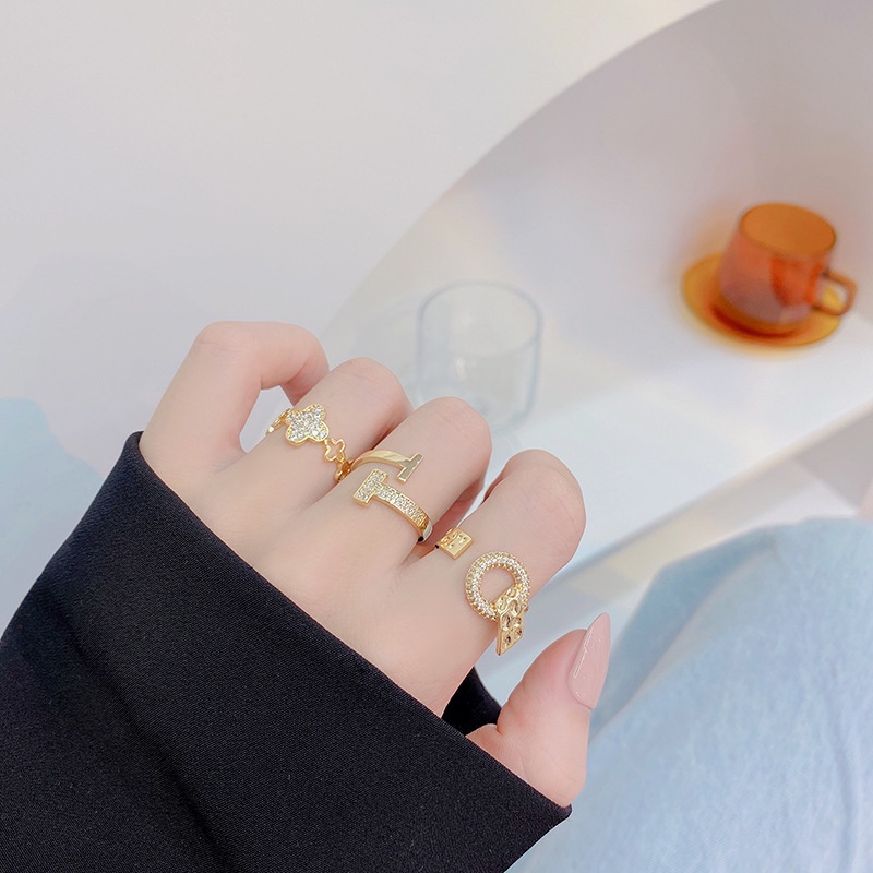 Nhẫn hở mạ vàng 14K hình chữ T đính đá zircon thời trang