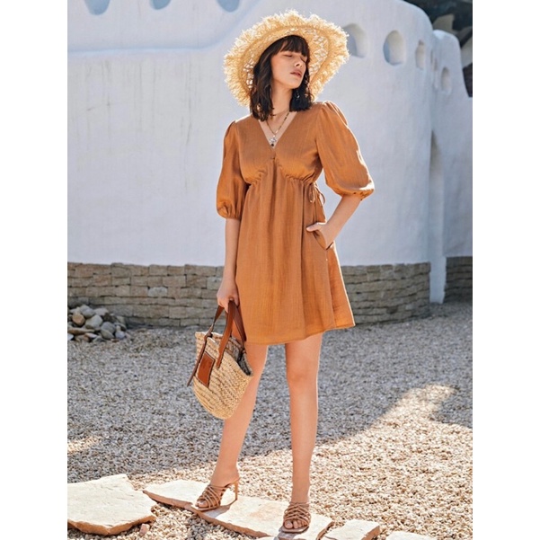 Đầm màu cánh gián dư