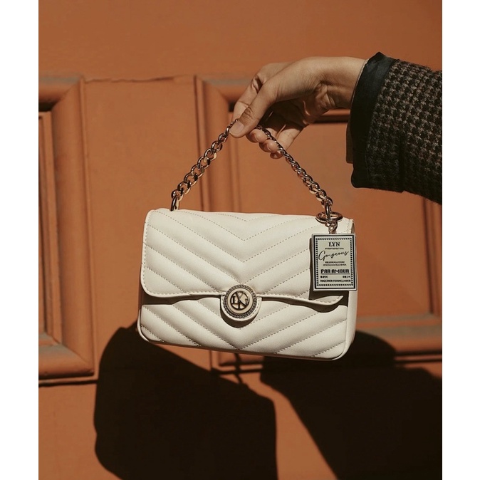 Túi lyn isabel khoá tròn màu trắng