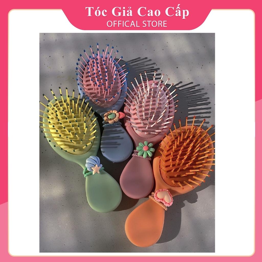 Lược chải tóc màu paster , kèm dây cột tóc, có sẵn