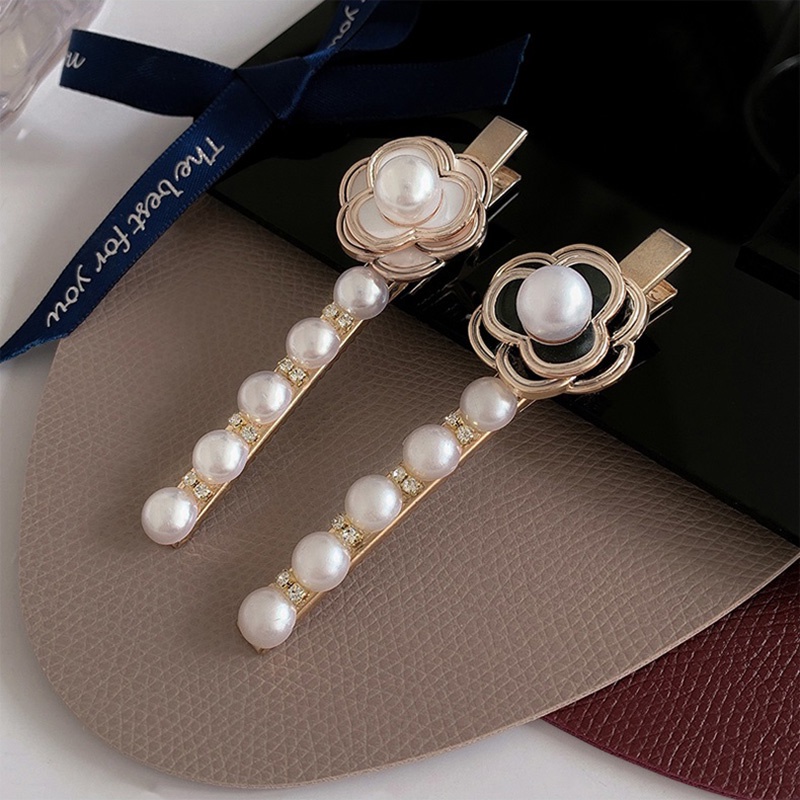 Kẹp tóc một bên đính ngọc trai nhân tạo thời trang 2021