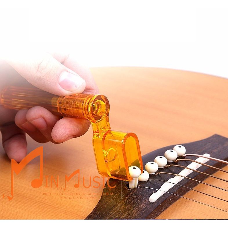 Tay quay thay dây đàn guitar l thay dây nhanh chóng