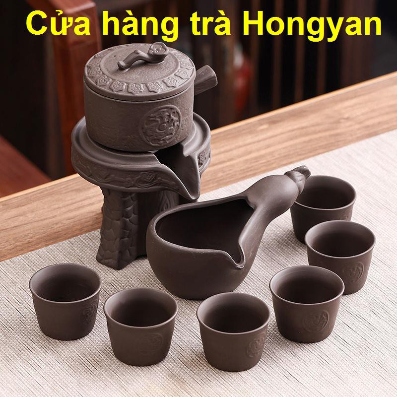 Bộ ấm trà lười Kung Fu hoàn toàn bán tự động gốm sứ gia dụng cát tím Sáng tạo tách biển