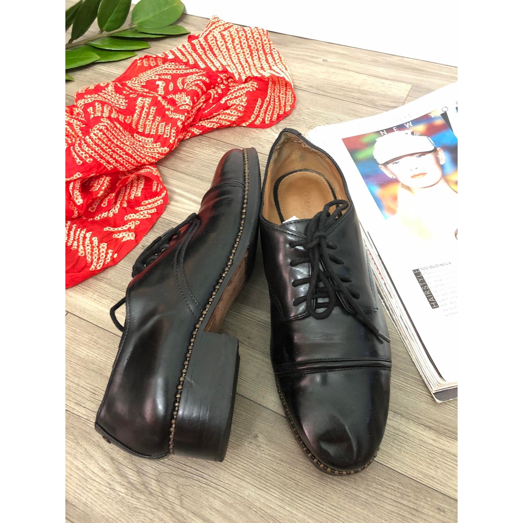 Đôi giày đế Dr Martens nặng hiệu Coach, đã qua sử dụng
