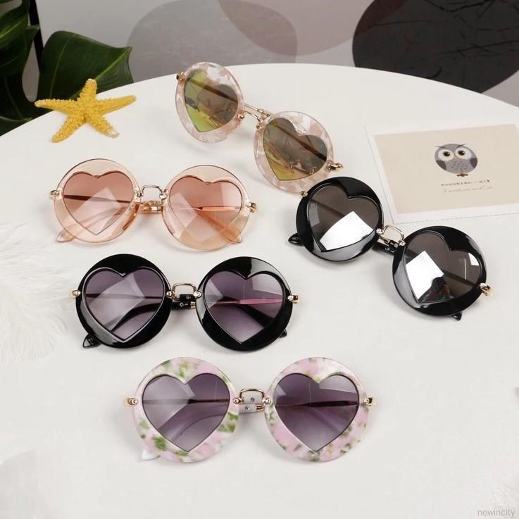 Kính mát hình trái tim chống tia UV kiểu dáng retro thời trang cho bé