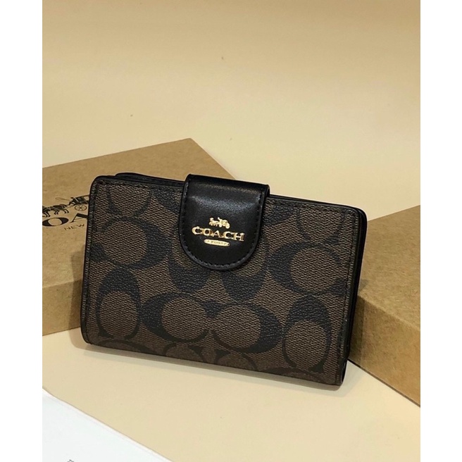Ví Coach mini cầm tay nhỏ gọn