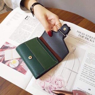 Ví cầm tay đầu rồng