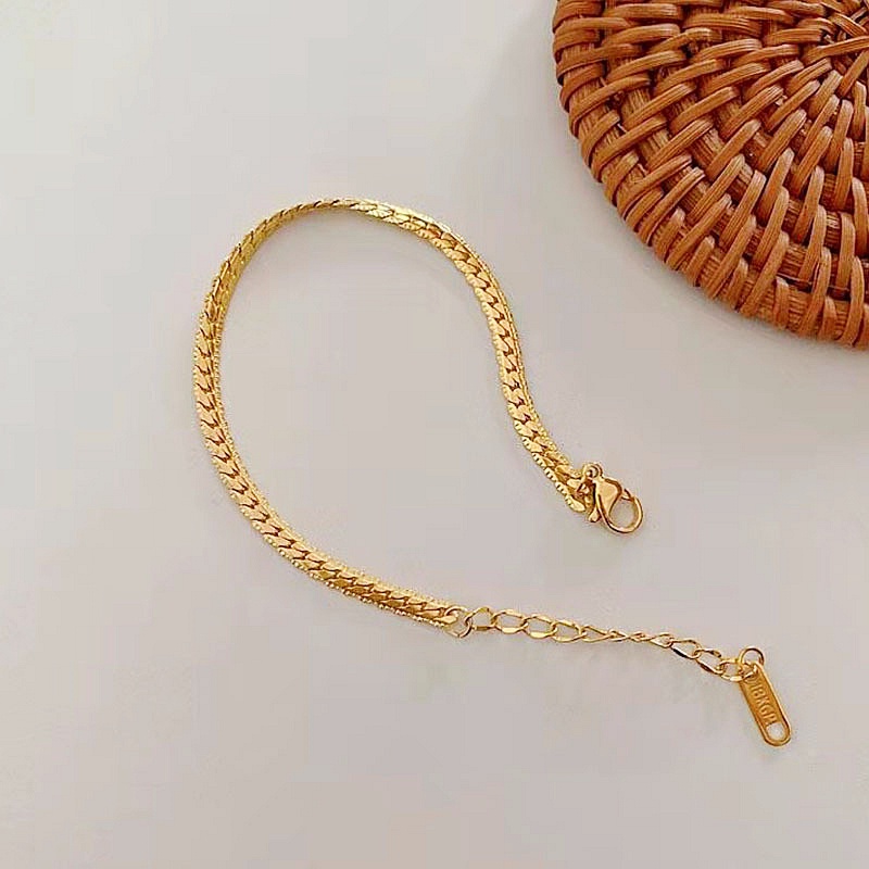 Lắc tay titan không gỉ thiết kế dáng dây bện vải trơn mạ vàng 18k thời trang thanh lịch
