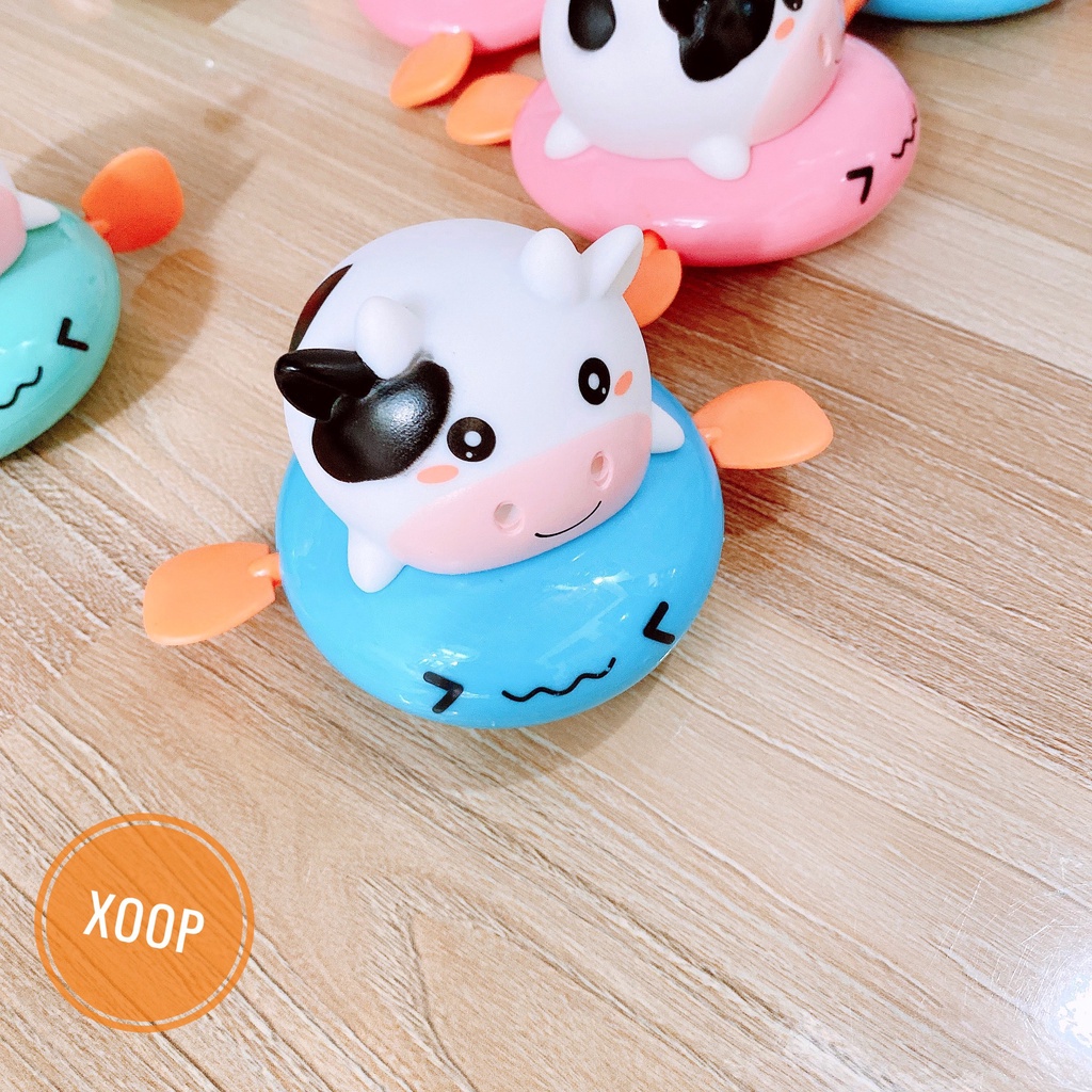 Đồ chơi nhà tắm bò sữa chèo thuyền phun nước vặn cót ngộ nghĩnh đáng yêu cho bé