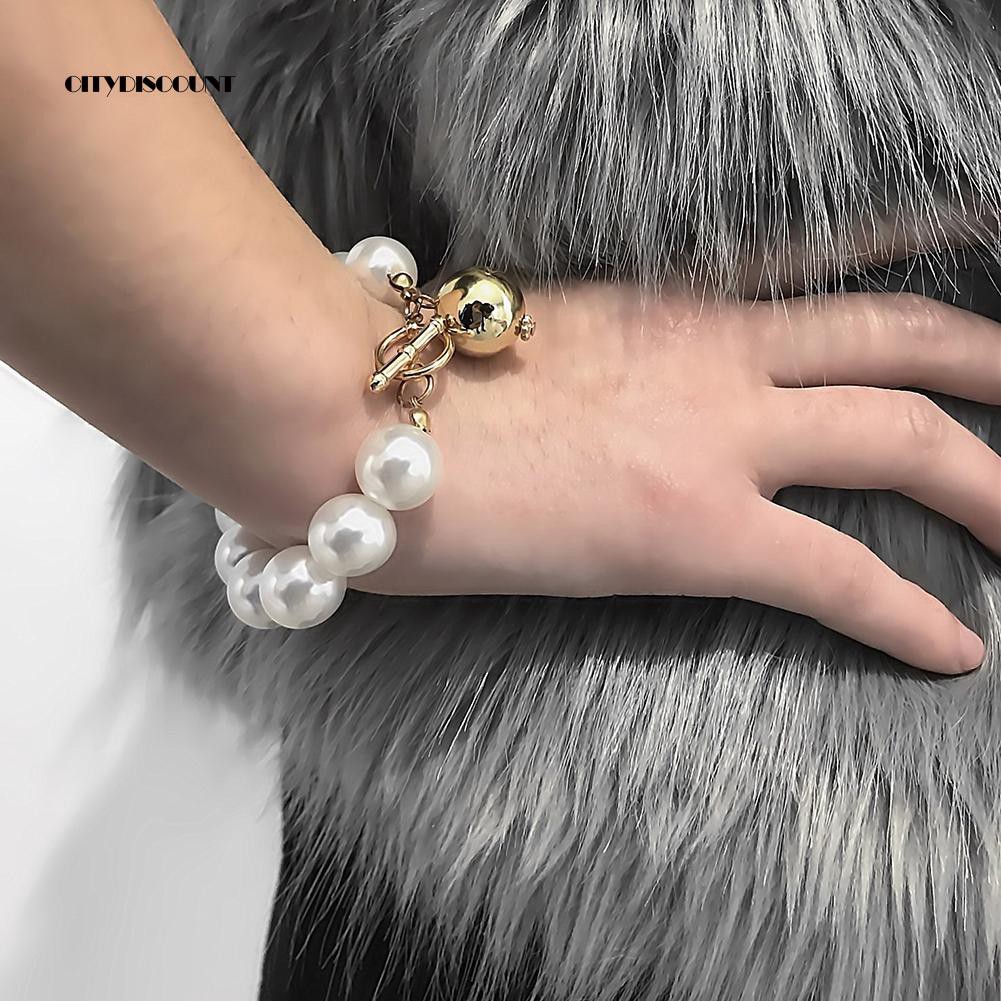 Vòng tay đính ngọc trai giả đơn giản | BigBuy360 - bigbuy360.vn