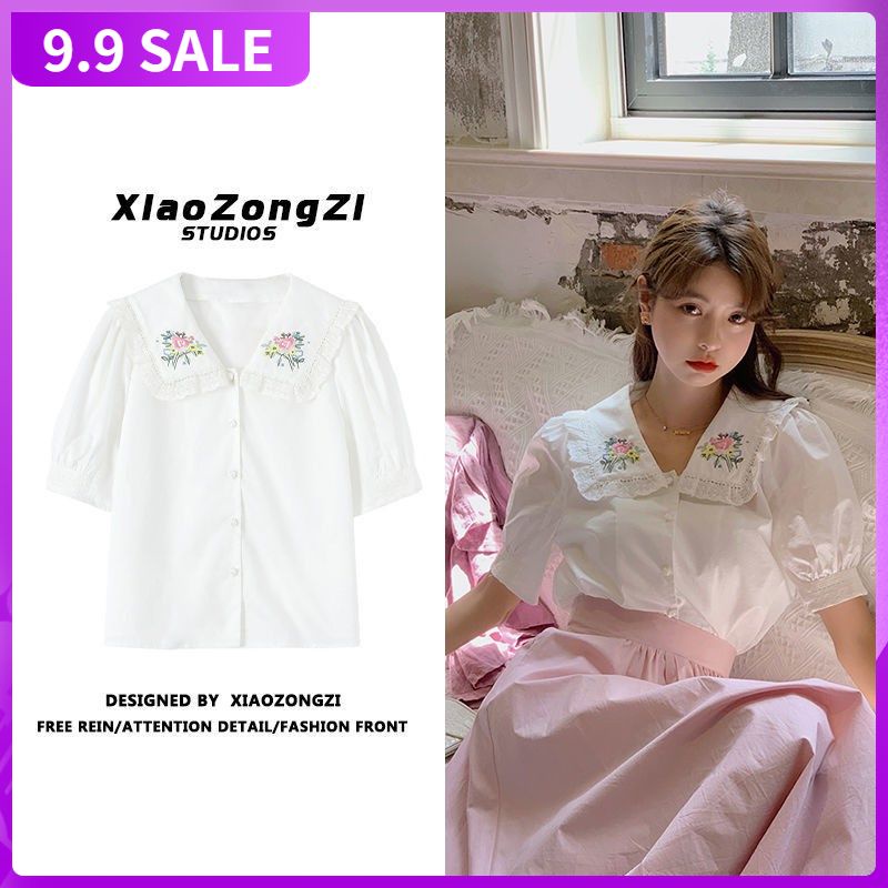Áo Sơ Mi Trắng Cổ Búp Bê Tay Phồng In Họa Tiết Hoa Phong Cách Hồng Kông Cổ Điển Thời Trang Mùa Hè Mới Cho Nữ 2021