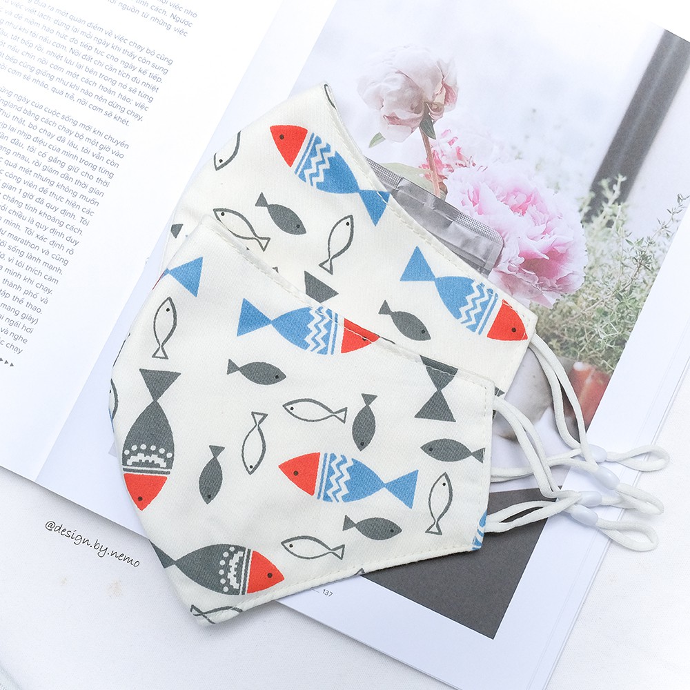 Khẩu Trang Vải Nemo Handmade Họa tiết Cá nền trắng nổi bật, có nút tăng giảm dây tiện lợi - KTCaNenTrang | BigBuy360 - bigbuy360.vn