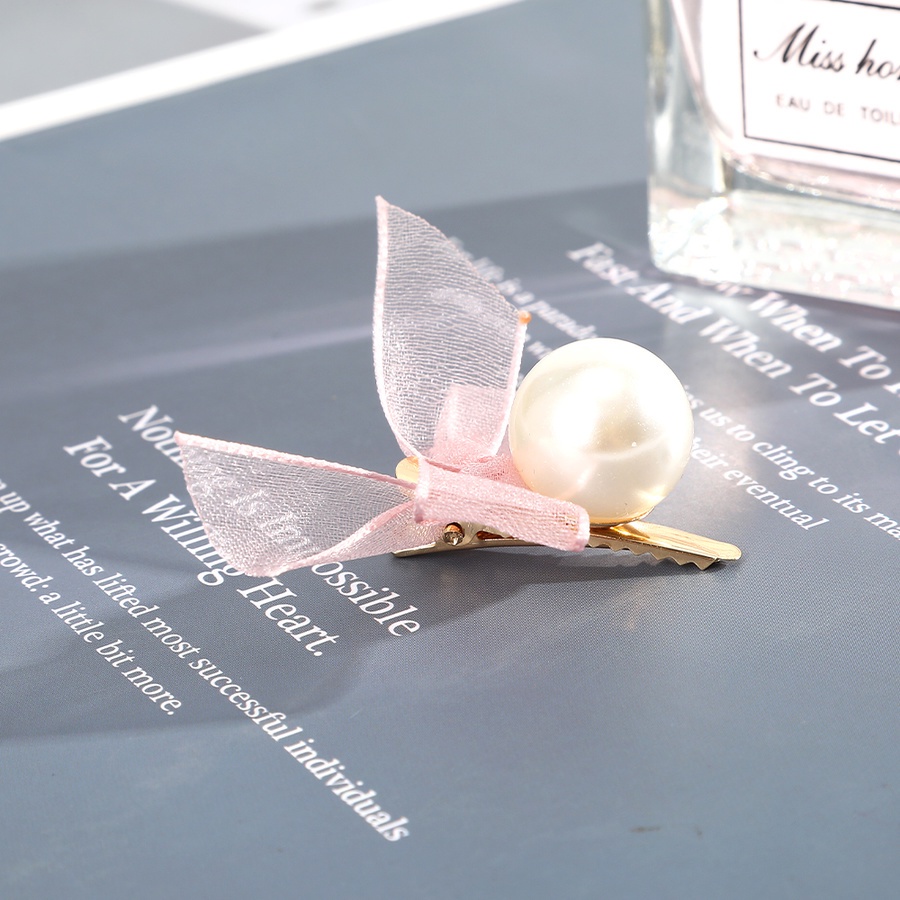 Kẹp tóc hình nơ đính ngọc trai xinh xắn dành cho nữ