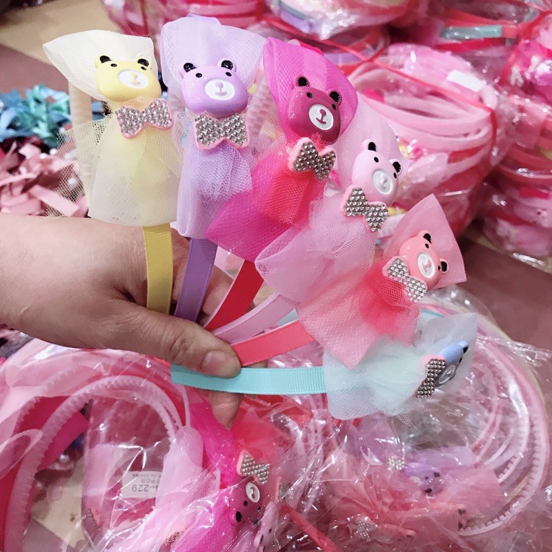 Sỉ 10 cài tóc nơ ren gắn các hoạ tiết hình thú xinh xắn cho các bé