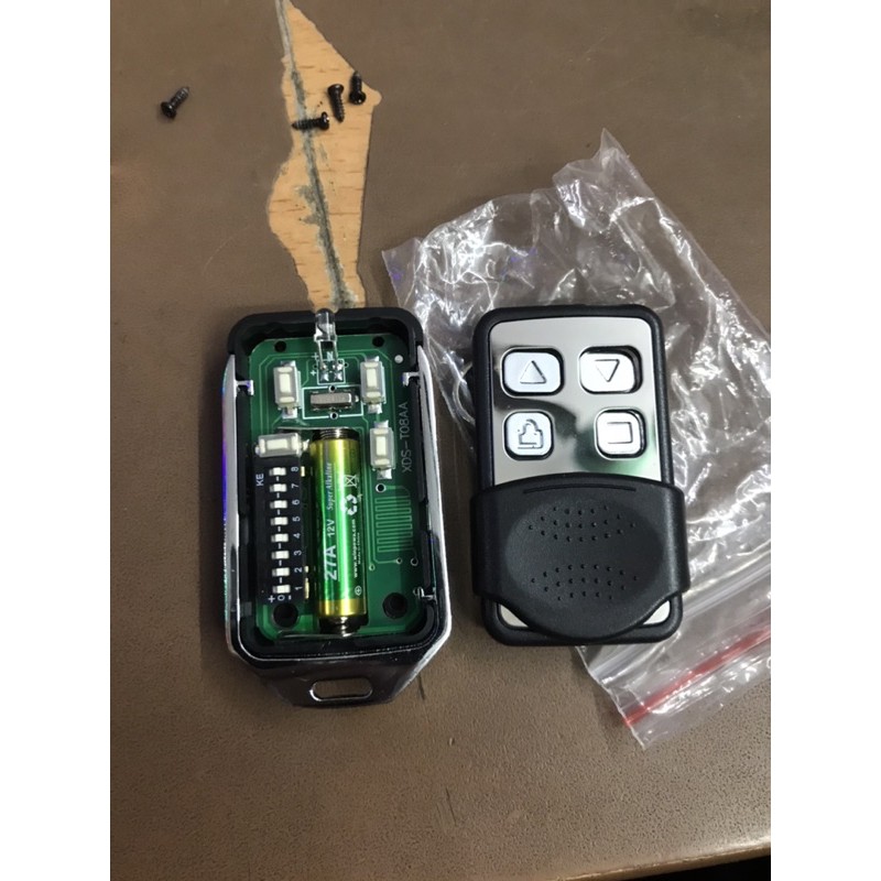 Tay khiển remote cửa cuốn mã gạt 433 Hàng chính hãng