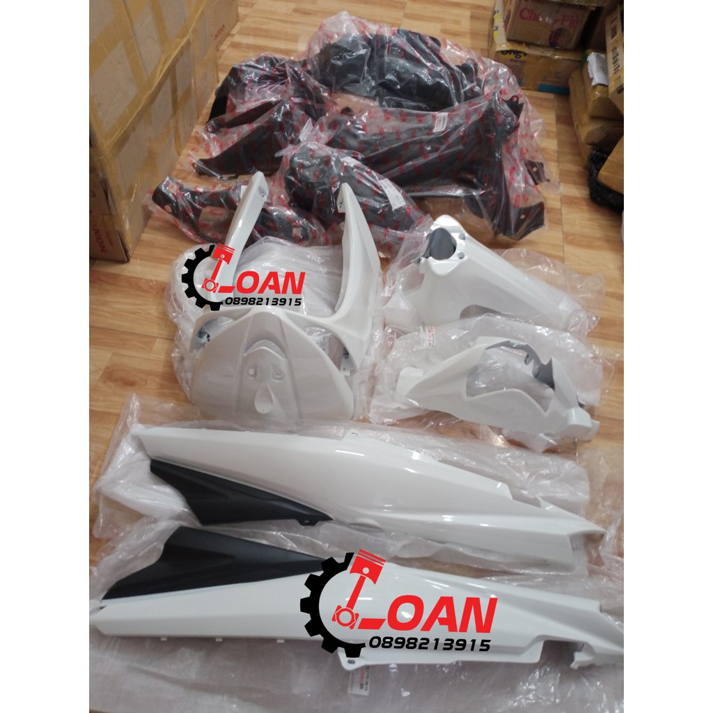 DÀN ÁO XE TAURUS MÀU TRẮNG  ZIN