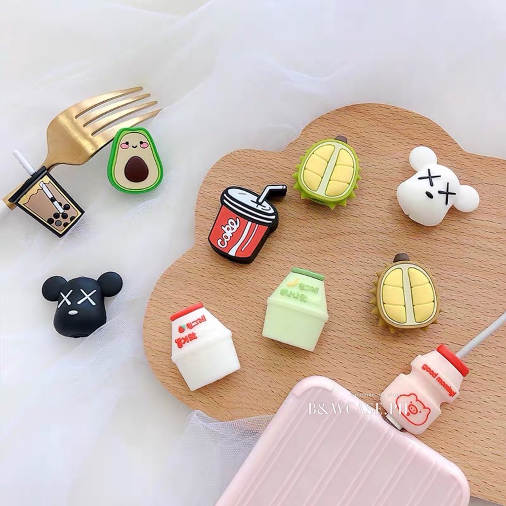 Phụ kiện bảo vệ đầu dây cáp sạc truyền dữ liệu thiết kế trái cây/ kaws/ nhiều mẫu khác hoạt hình đáng yêu cho iPhone