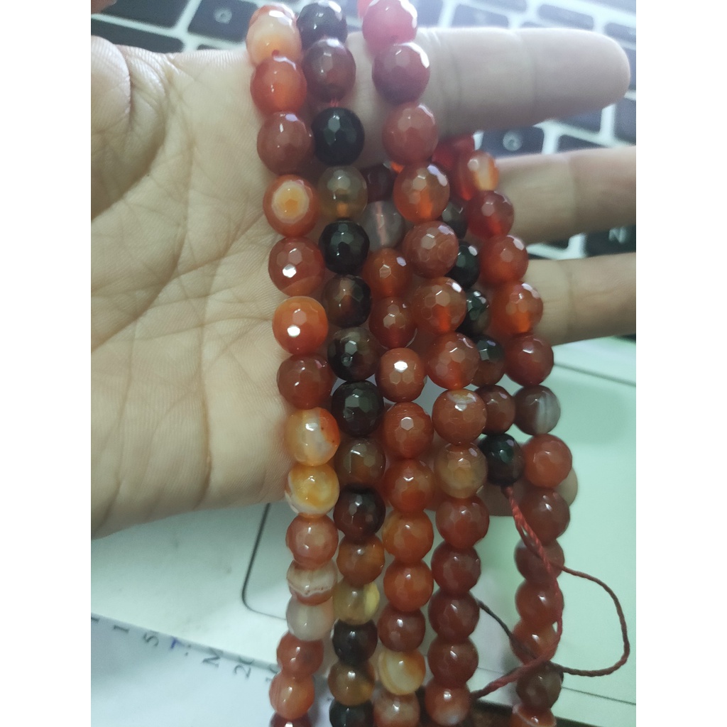 2 viên đá tự nhien góc màu đỏ lấp lánh