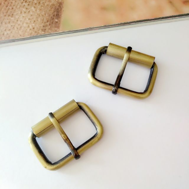 Khoá kim làm quai túi ví