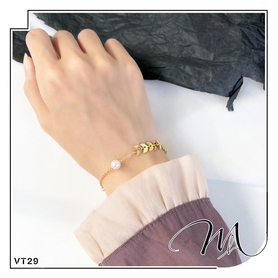 Lắc tay nữ Titan hình lá nguyệt quế ngọc trai nhân tạo Titan không gỉ - Măng's House VT29