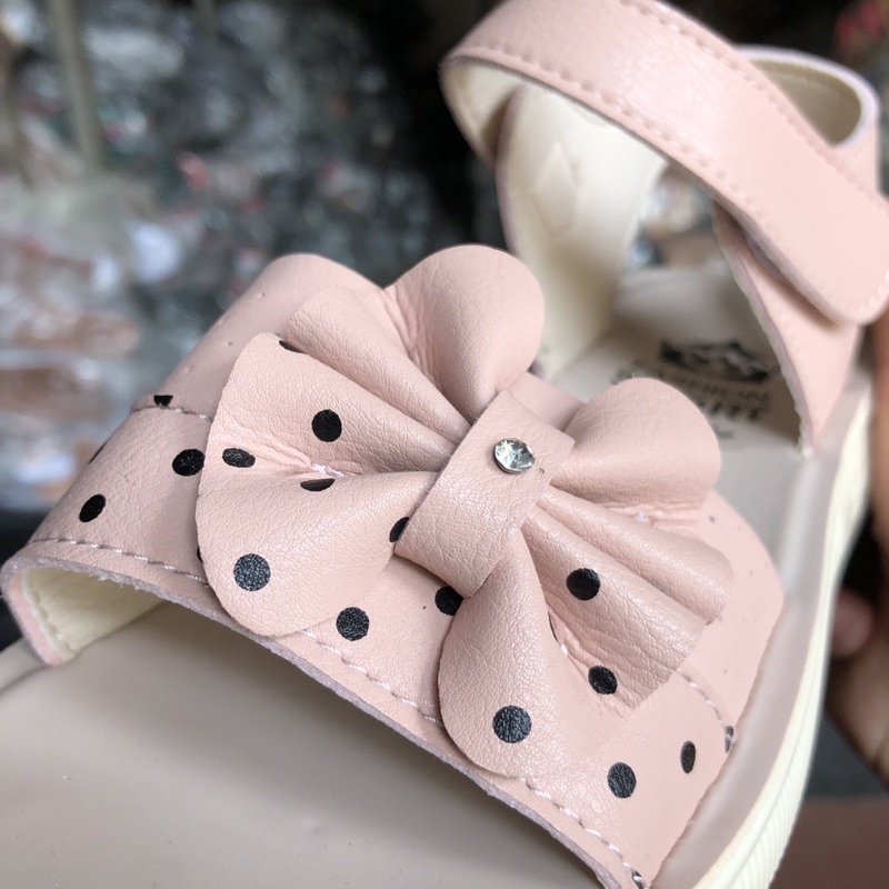 Dép trẻ em sandal bé gái hình nơ chấm bi bản ngang , quai hậu học sinh da đế cao su nhẹ xpa giá rẻ