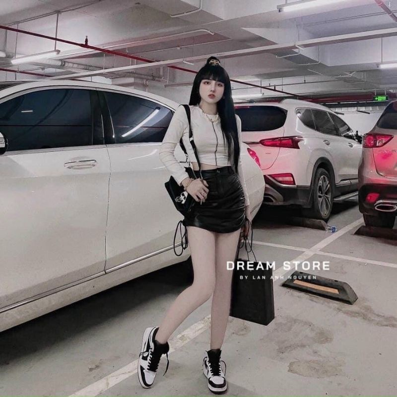 Chân váy da rút dây 2 bên có may kèm quần