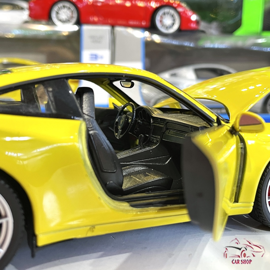 Mô hình xe ô tô Porsche 911 Carrera S Hãng Welly tỉ lệ 1:24 màu vàng