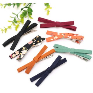 combo dây buộc tóc + nơ tóc chữ X ( dạng kẹp ) xinh xắn