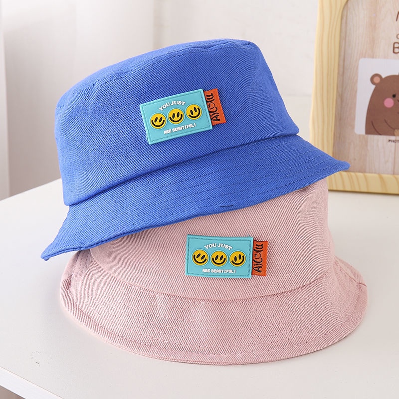 Mũ bucket da họa tiết mặt cười dễ thương cho bé