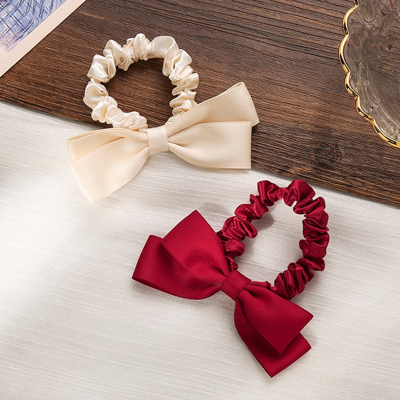 Dây buộc tóc bằng cao su đính nơ dễ thương cho nữ