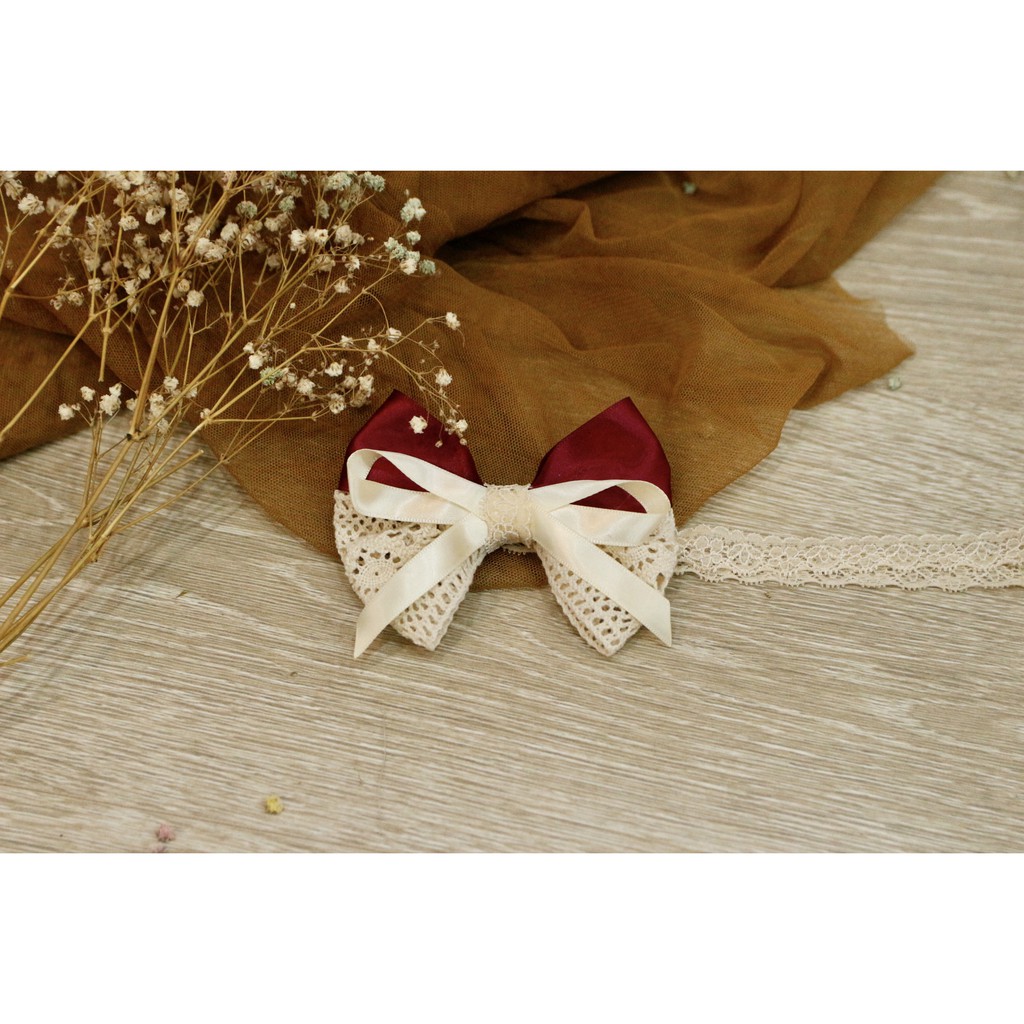 Băng đô nơ ren phối sang chảnh cho bé.