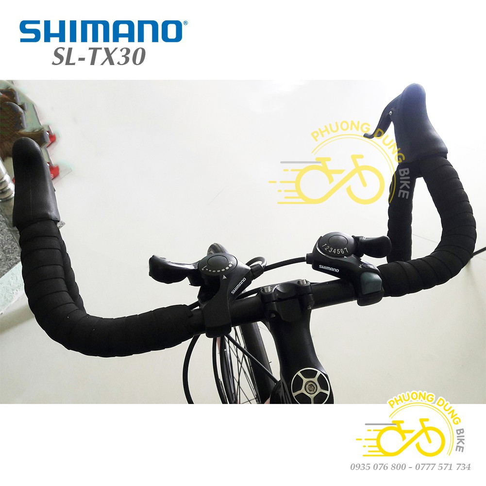 Cặp đề gắn ghi đông xe đạp Shimano SL-TX30-7