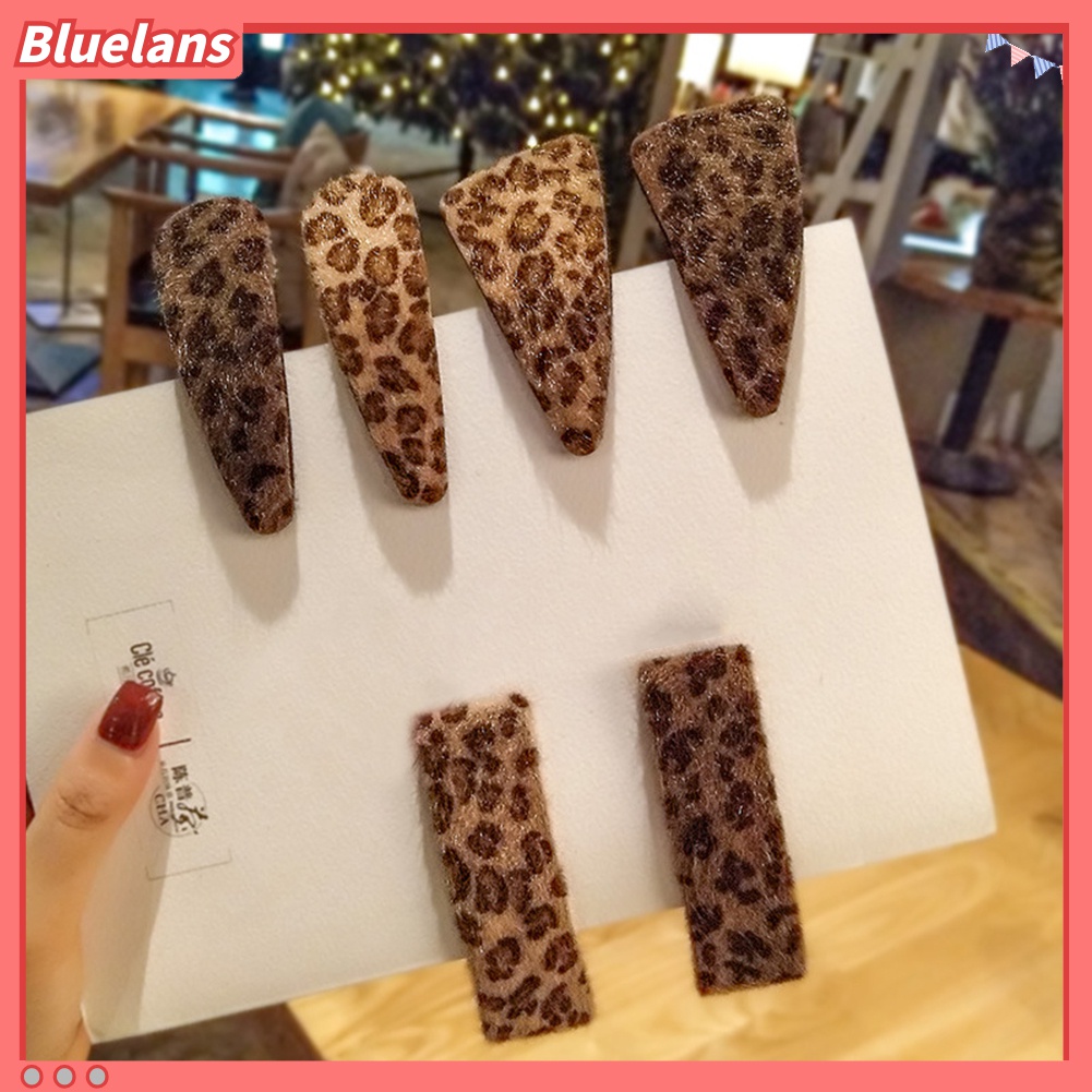 Kẹp tóc hình lông vũ thời trang